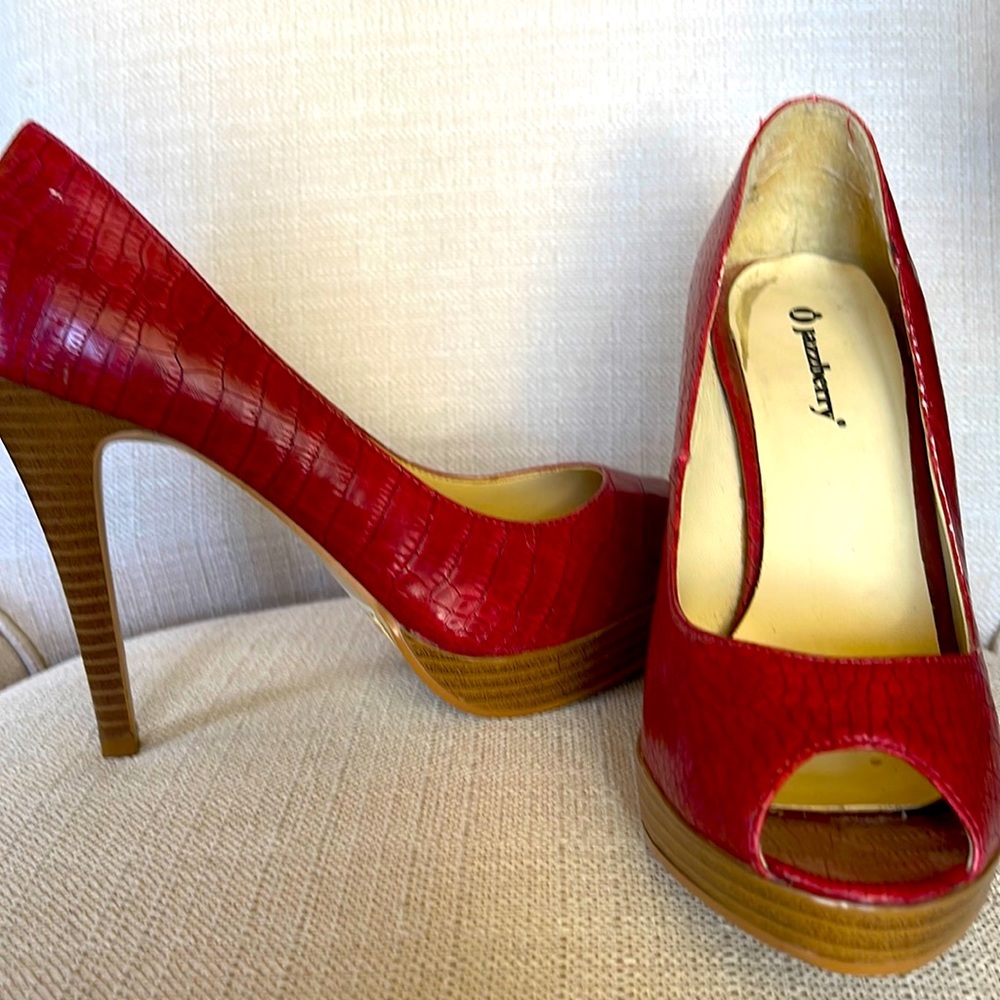 Red reptile looking stilletoes
